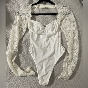White small bodysuit with lace sleeves